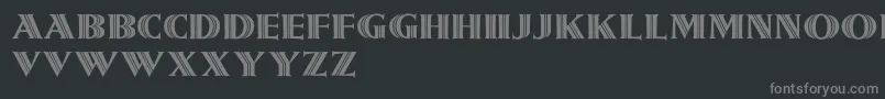 Girnalmond-fontti – harmaat kirjasimet mustalla taustalla