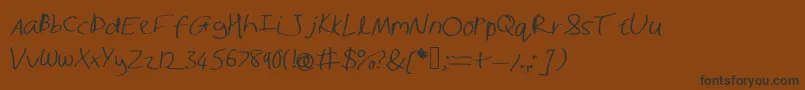 Shaunhand-Schriftart – Schwarze Schriften auf braunem Hintergrund