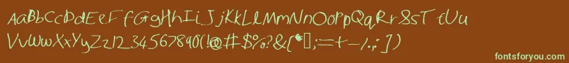 フォントShaunhand – 緑色の文字が茶色の背景にあります。
