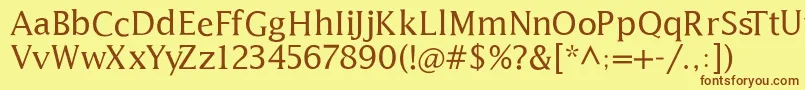 フォントLatine – 茶色の文字が黄色の背景にあります。