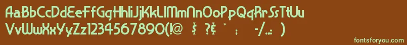 フォントSnappyse – 緑色の文字が茶色の背景にあります。
