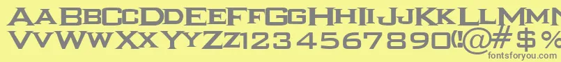 フォントIkarrg – 黄色の背景に灰色の文字