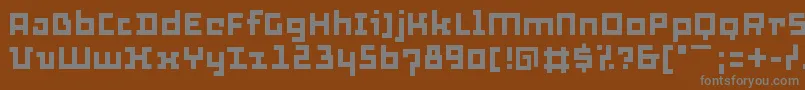 Thirtysix-fontti – harmaat kirjasimet ruskealla taustalla