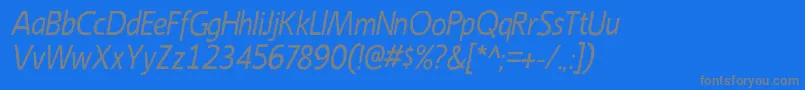 EmoryItalic-Schriftart – Graue Schriften auf blauem Hintergrund