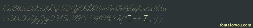 フォントLearningcurvedashed – 黒い背景に黄色の文字