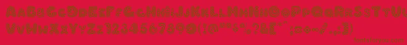 Więcej informacji o czcionce Hypmotizin Czcionka Hypmotizin – brązowe czcionki na czerwonym tle