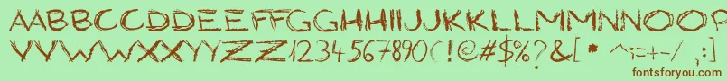 GrungyStyle Font – Brown Fonts on Green Background