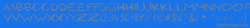 GrungyStyle Font – Gray Fonts on Blue Background