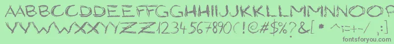 GrungyStyle Font – Gray Fonts on Green Background