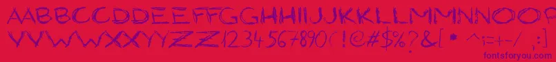 GrungyStyle Font – Purple Fonts on Red Background