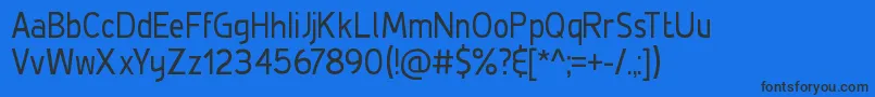DeLuxeCondensed Font – Black Fonts on Blue Background