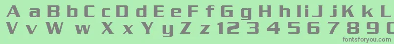 DgSerpentine-fontti – harmaat kirjasimet vihreällä taustalla