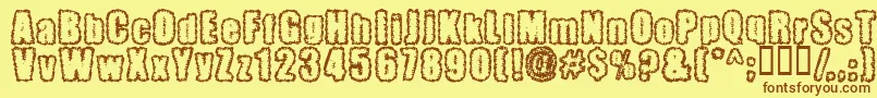 Pinniepo Font – Brown Fonts on Yellow Background