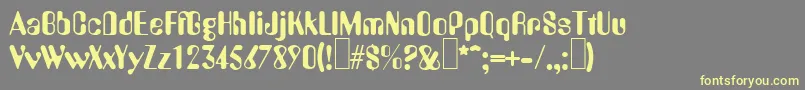 フォントA770DecoRegular – 黄色のフォント、灰色の背景