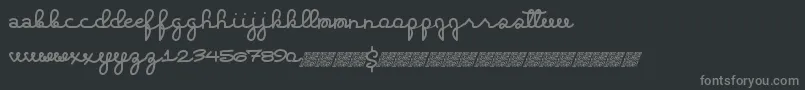 Extrahighs-fontti – harmaat kirjasimet mustalla taustalla
