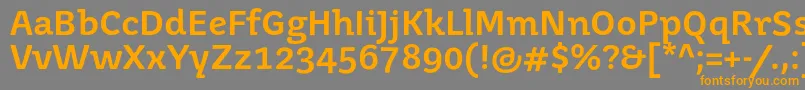 フォントJuvenismedium – オレンジの文字は灰色の背景にあります。