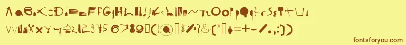 フォントCooksyCutter – 茶色の文字が黄色の背景にあります。
