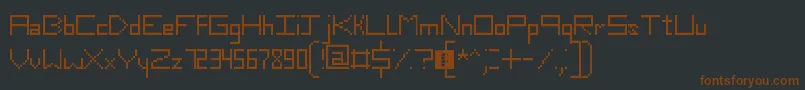 Czcionka SlimThirteenPixelFonts – brązowe czcionki na czarnym tle