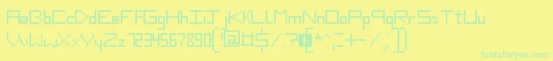 SlimThirteenPixelFonts-Schriftart – Grüne Schriften auf gelbem Hintergrund