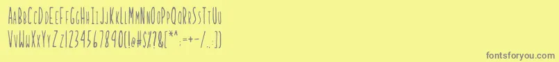 LadybugRegularB-Schriftart – Graue Schriften auf gelbem Hintergrund