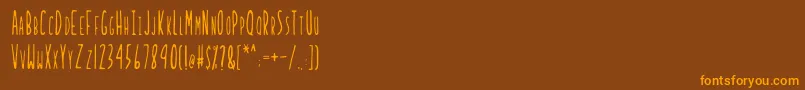 LadybugRegularB Font – Orange Fonts on Brown Background