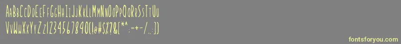 LadybugRegularB Font – Yellow Fonts on Gray Background