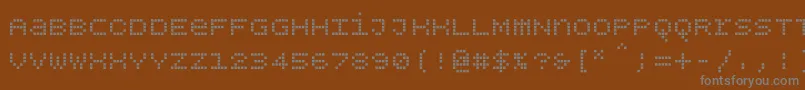 Шрифт Bpdotsunicasesquare – серые шрифты на коричневом фоне