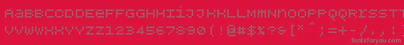 Шрифт Bpdotsunicasesquare – серые шрифты на красном фоне