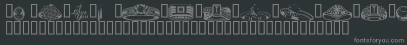 Wmjewelry-fontti – harmaat kirjasimet mustalla taustalla