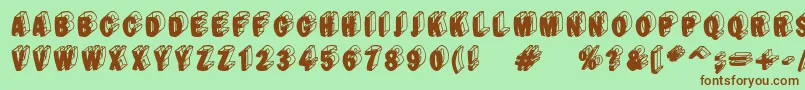 More about Blacte Font Blacte Font – Brown Fonts on Green Background