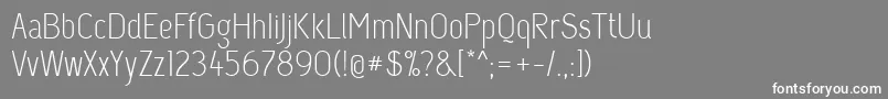 フォントCapsuula – 灰色の背景に白い文字