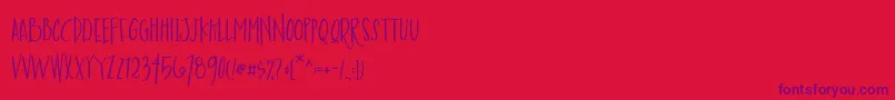 AustieBostEnvelopesPrint Font – Purple Fonts on Red Background