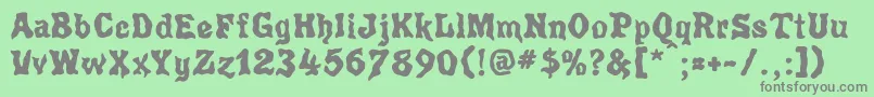 フォントPoultryg – 緑の背景に灰色の文字
