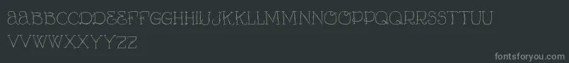 VtksCurumin-Schriftart – Graue Schriften auf schwarzem Hintergrund