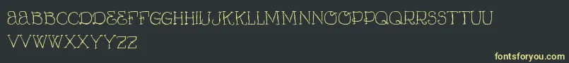 VtksCurumin Font – Yellow Fonts on Black Background