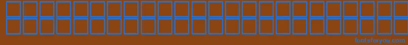 Czcionka KufiBold – niebieskie czcionki na brązowym tle