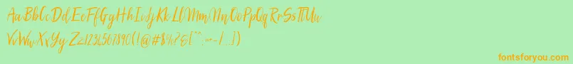 SilhouettoScript Font – Orange Fonts on Green Background