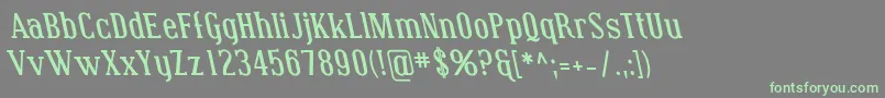 フォントCovingtonRevBoldItalic – 灰色の背景に緑のフォント