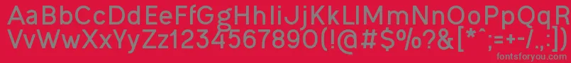 OgonekBold-Schriftart – Graue Schriften auf rotem Hintergrund