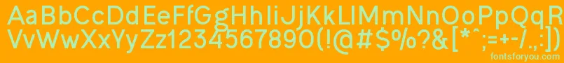 OgonekBold-Schriftart – Grüne Schriften auf orangefarbenem Hintergrund