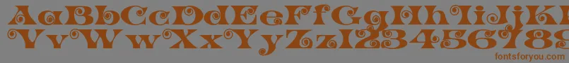 K22SpiralSwash-Schriftart – Braune Schriften auf grauem Hintergrund