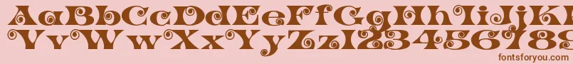 K22SpiralSwash Font – Brown Fonts on Pink Background