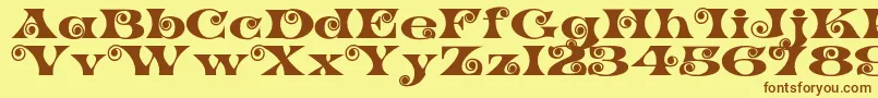 K22SpiralSwash Font – Brown Fonts on Yellow Background