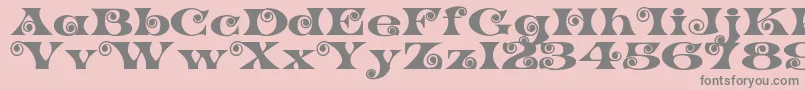 Más sobre la fuente K22SpiralSwash fuente K22SpiralSwash – Fuentes Grises Sobre Fondo Rosa