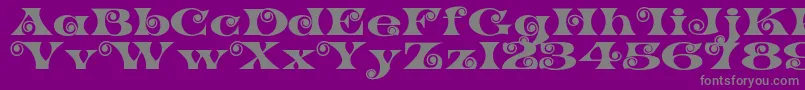 K22SpiralSwash Font – Gray Fonts on Purple Background