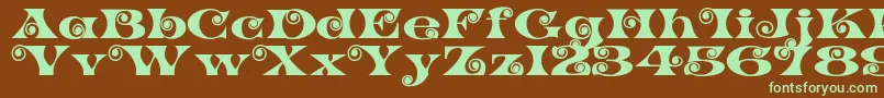 K22SpiralSwash Font – Green Fonts on Brown Background