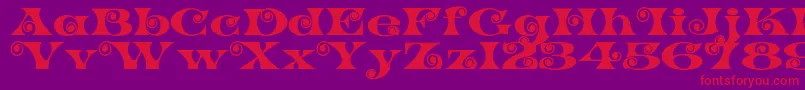 K22SpiralSwash Font – Red Fonts on Purple Background