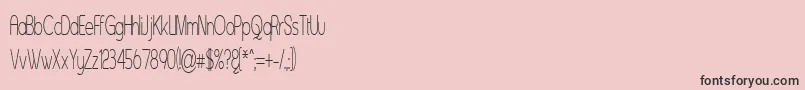 Czcionka Asenst – czarne czcionki na różowym tle