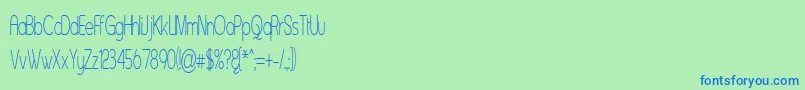 Czcionka Asenst – niebieskie czcionki na zielonym tle
