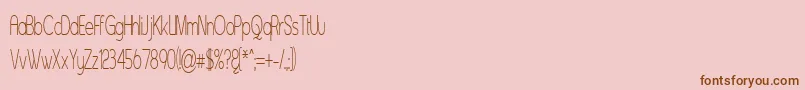 Czcionka Asenst – brązowe czcionki na różowym tle